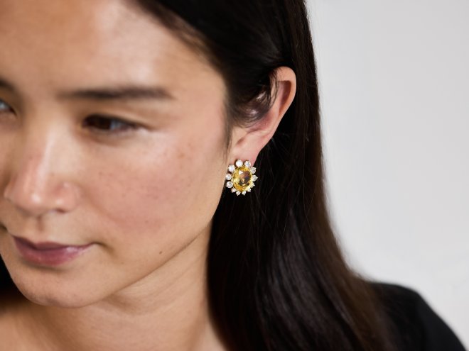 Yellow Ceylon sapphire and diamond cluster earrings, circa 1960.