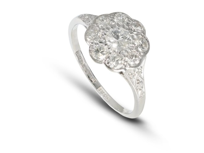 Diamond coronet cluster ring, English, circa 1940s. 