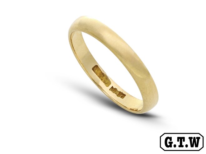 Yellow gold wedding band, circa 1960. 