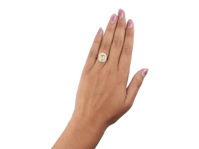 Yellow Ceylon sapphire and diamond coronet cluster ring, circa 1910.