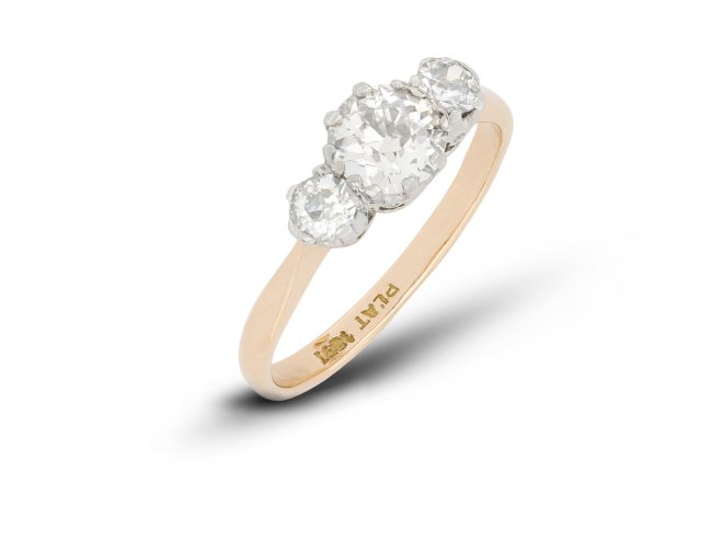 Old cut diamond three stone ring, circa 1910.