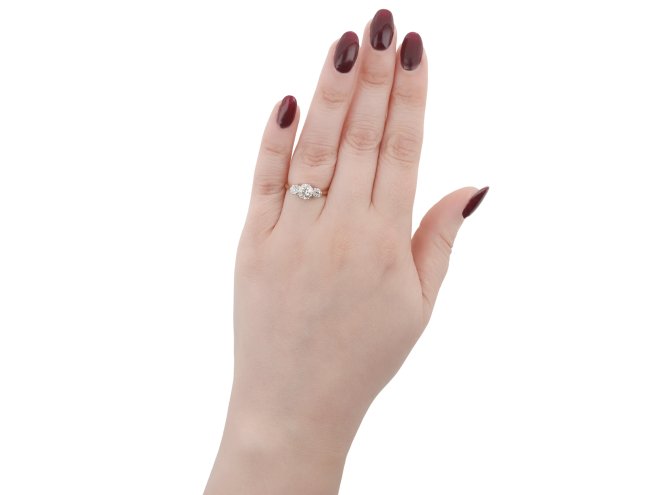 Old cut diamond three stone ring, circa 1910.