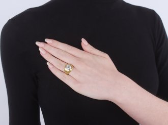 Emerald cut diamond gypsy ring, circa 1970.