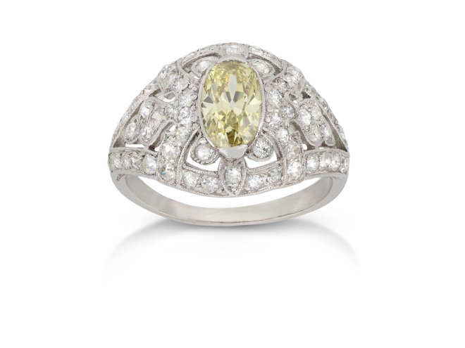 Yellow diamond cluster ring, French, circa 1925.