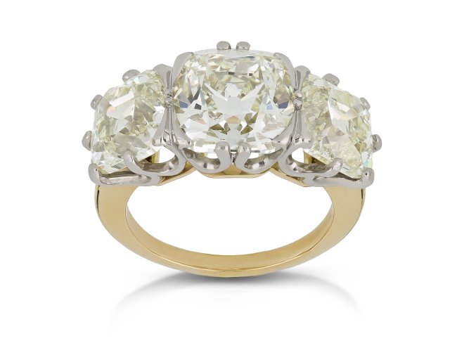 Old mine diamond three stone ring.