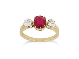 Burmese ruby and diamond three stone ring, circa 1900.