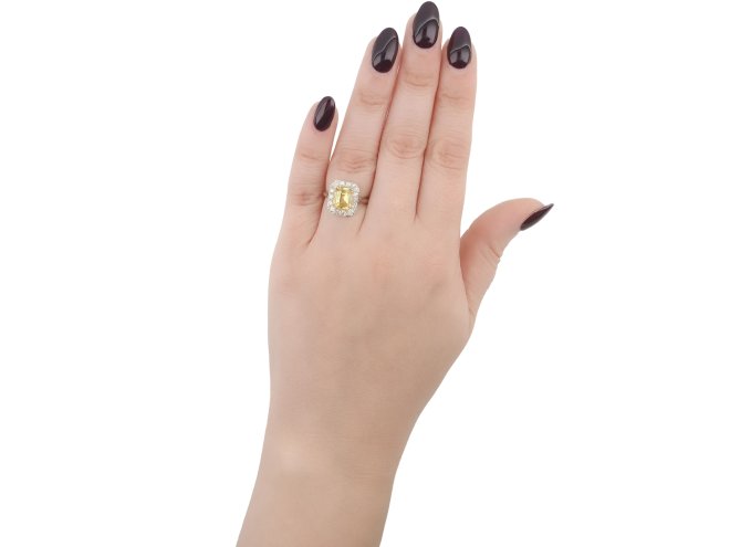 Yellow Ceylon sapphire and diamond cluster ring, circa 1920.
