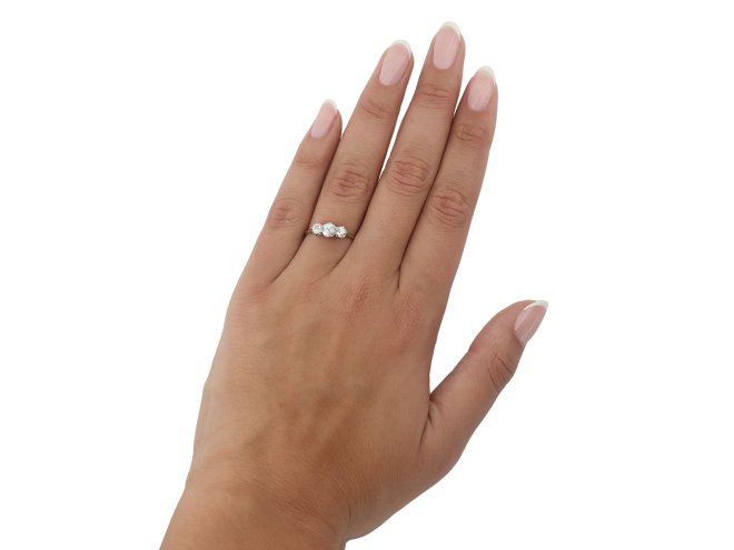 Old cut diamond three stone, circa 1915.