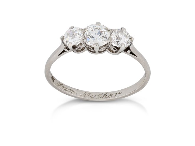 Old cut diamond three stone, circa 1915.