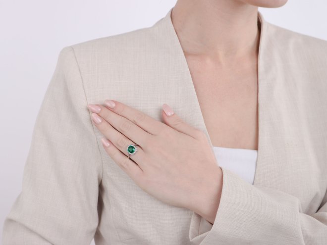 Colombian emerald and diamond coronet cluster ring, French, 1915.