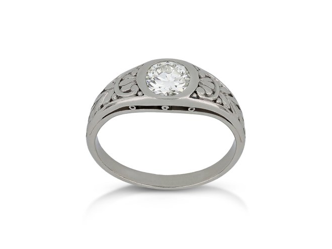 Diamond carved solitaire ring, circa 1915.