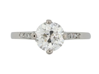 Old cut diamond flanked solitaire ring, circa 1915.