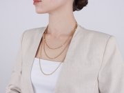 Yellow gold and pearl longuard chain, circa 1900. 