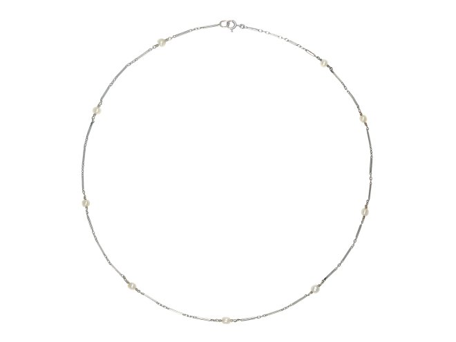 Natural pearl gold chain, circa 1920. 