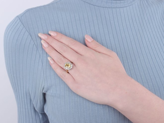 Yellow Ceylon sapphire and diamond coronet cluster ring, circa 1910.