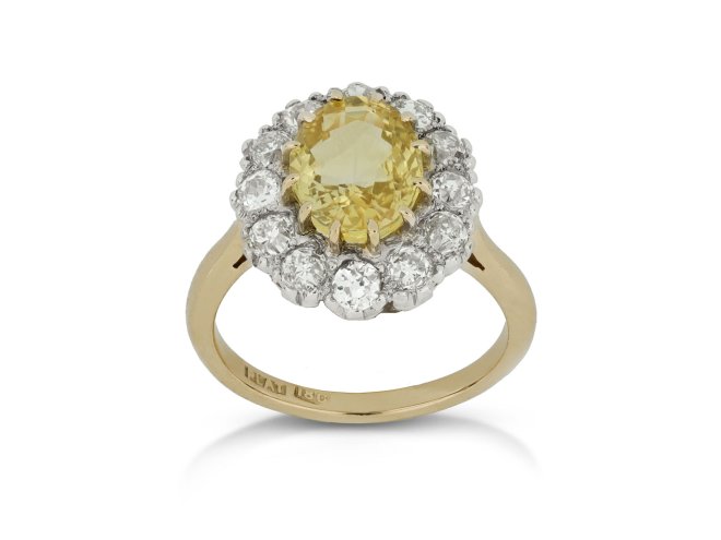 Yellow Ceylon sapphire and diamond coronet cluster ring, circa 1910.