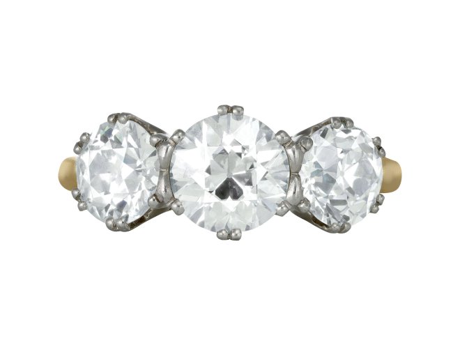 Old cut diamond three stone ring, circa 1910. 