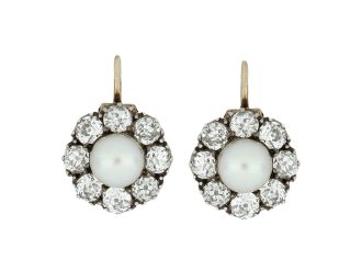 Natural pearl and diamond cluster earrings, circa 1880.