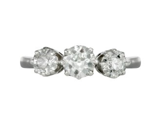 Old cut diamond three stone ring, circa 1950. 