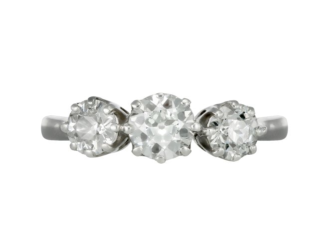 Old cut diamond three stone ring, circa 1950. 