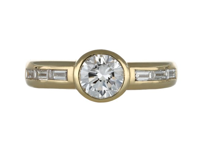 Diamond flanked solitaire ring by Wempe, German, circa 1970.