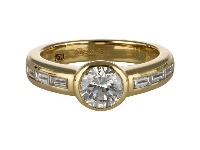Diamond flanked solitaire ring by Wempe, German, circa 1970.