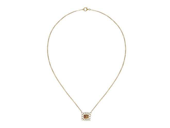 Fancy brown yellow diamond negligee pendant, circa 1915.