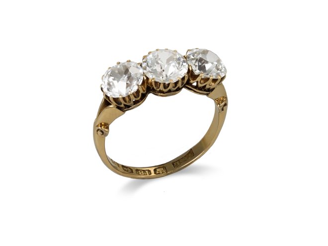 Old cut diamond three stone ring by Lawrence & Linguard, English, 1901. 