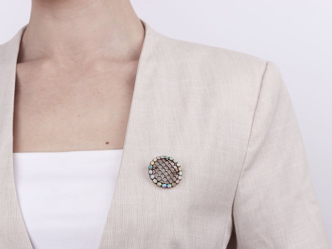 Victorian opal and diamond lattice brooch, circa 1900.