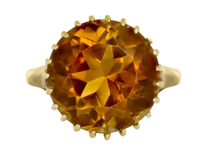 Citrine solitaire ring, circa 1900.