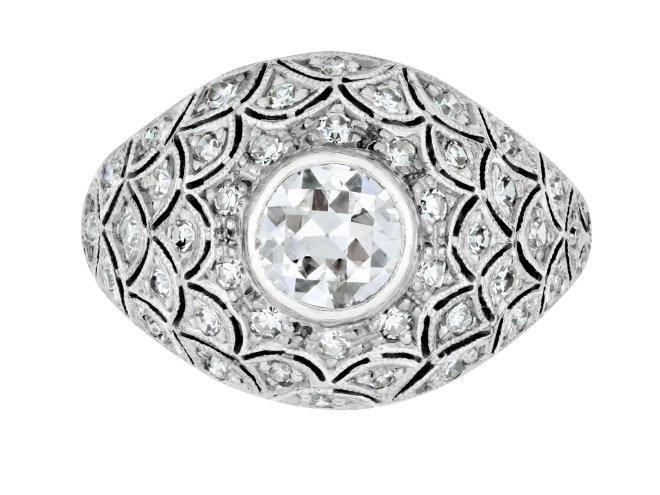 Bombé diamond cluster ring, circa 1930. 