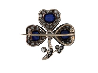 Sapphire and diamond clover brooch, circa 1860. 