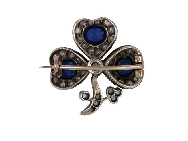 Sapphire and diamond clover brooch, circa 1860. 