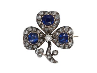 Sapphire and diamond clover brooch, circa 1860. 