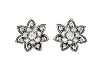 Vintage diamond cluster earrings, circa 1950. 