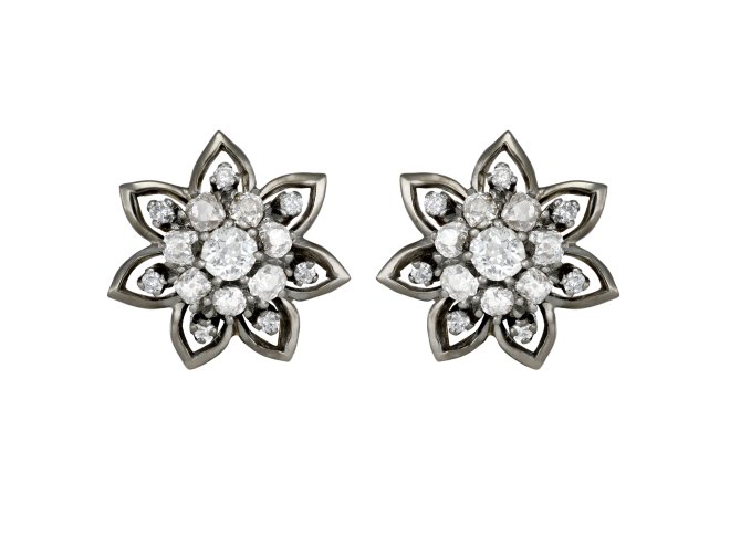 Vintage diamond cluster earrings, circa 1950. 