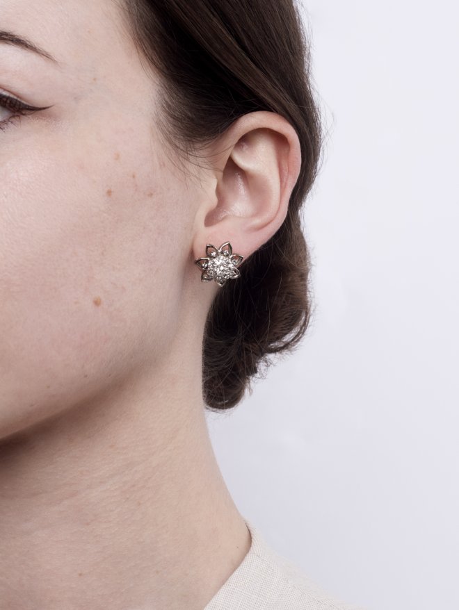 Vintage diamond cluster earrings, circa 1950. 