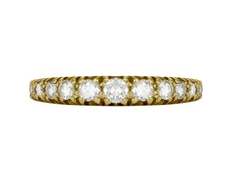 An 18ct yellow gold diamond half eternity ring