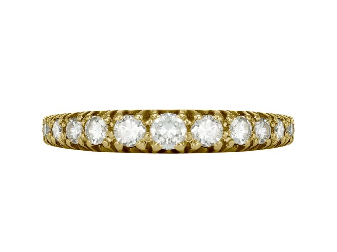 An 18ct yellow gold diamond half eternity ring