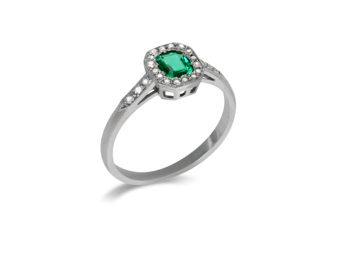 Emerald and diamond coronet cluster ring, circa 1950.