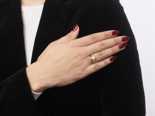 Yellow Ceylon sapphire and diamond ring. 