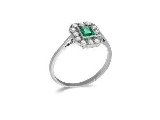 Emerald and diamond cluster ring, circa 1930.