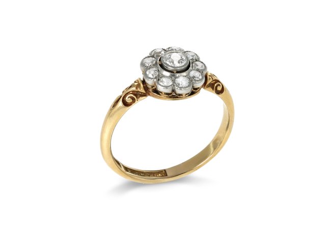 Diamond coronet cluster ring, English, circa 1905.