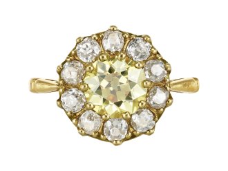 Fancy yellow diamond coronet cluster ring, circa 1900. 