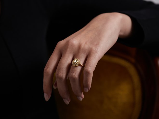 Fancy yellow diamond coronet cluster ring, circa 1900. 