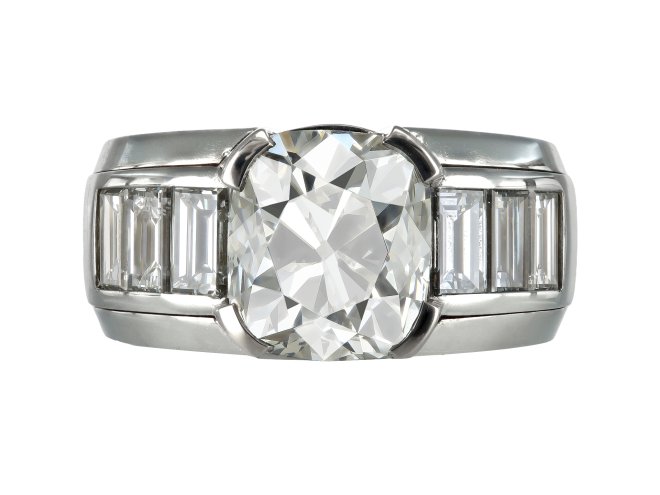 Hemmerle 5.27ct Diamond flanked solitaire ring, German.