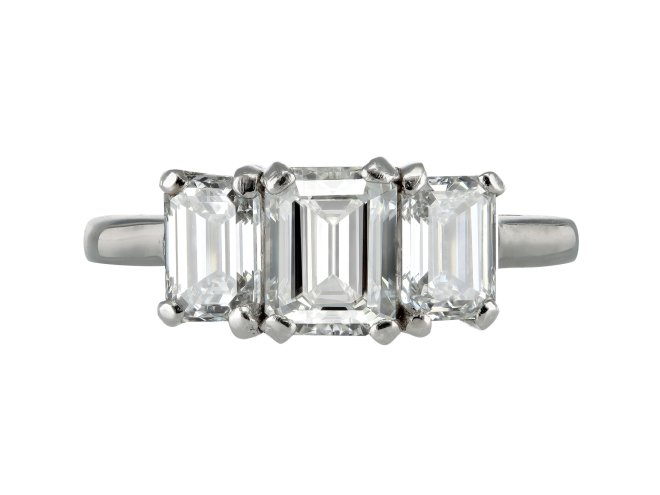 Emerald cut diamond three stone ring.