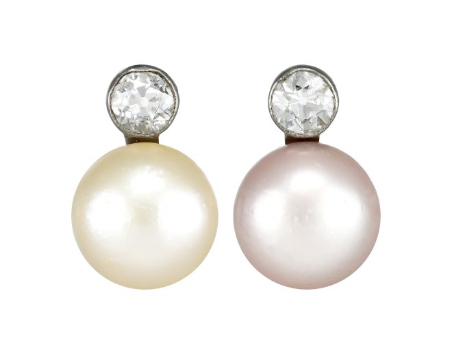 Natural pearl and diamond drop earrings, circa 1920.