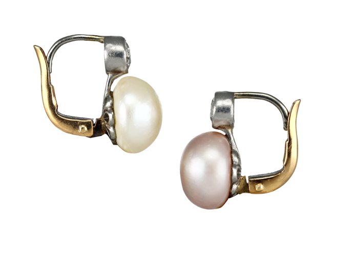 Natural pearl and diamond drop earrings, circa 1920.