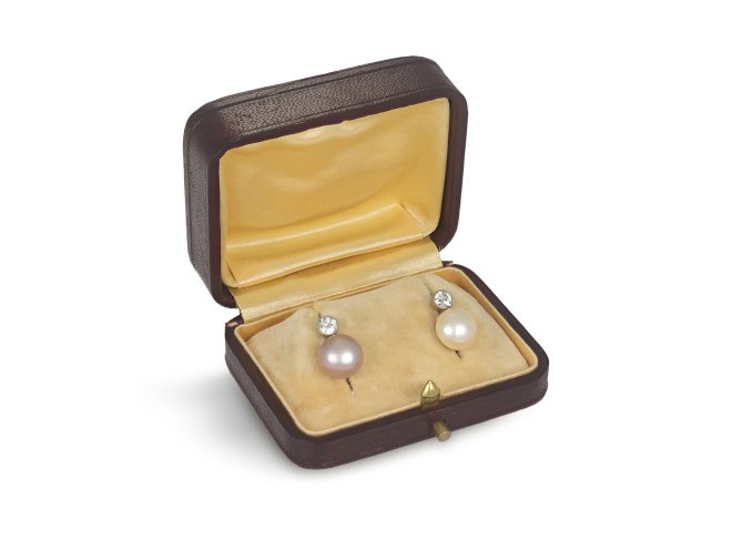 Natural pearl and diamond drop earrings, circa 1920.